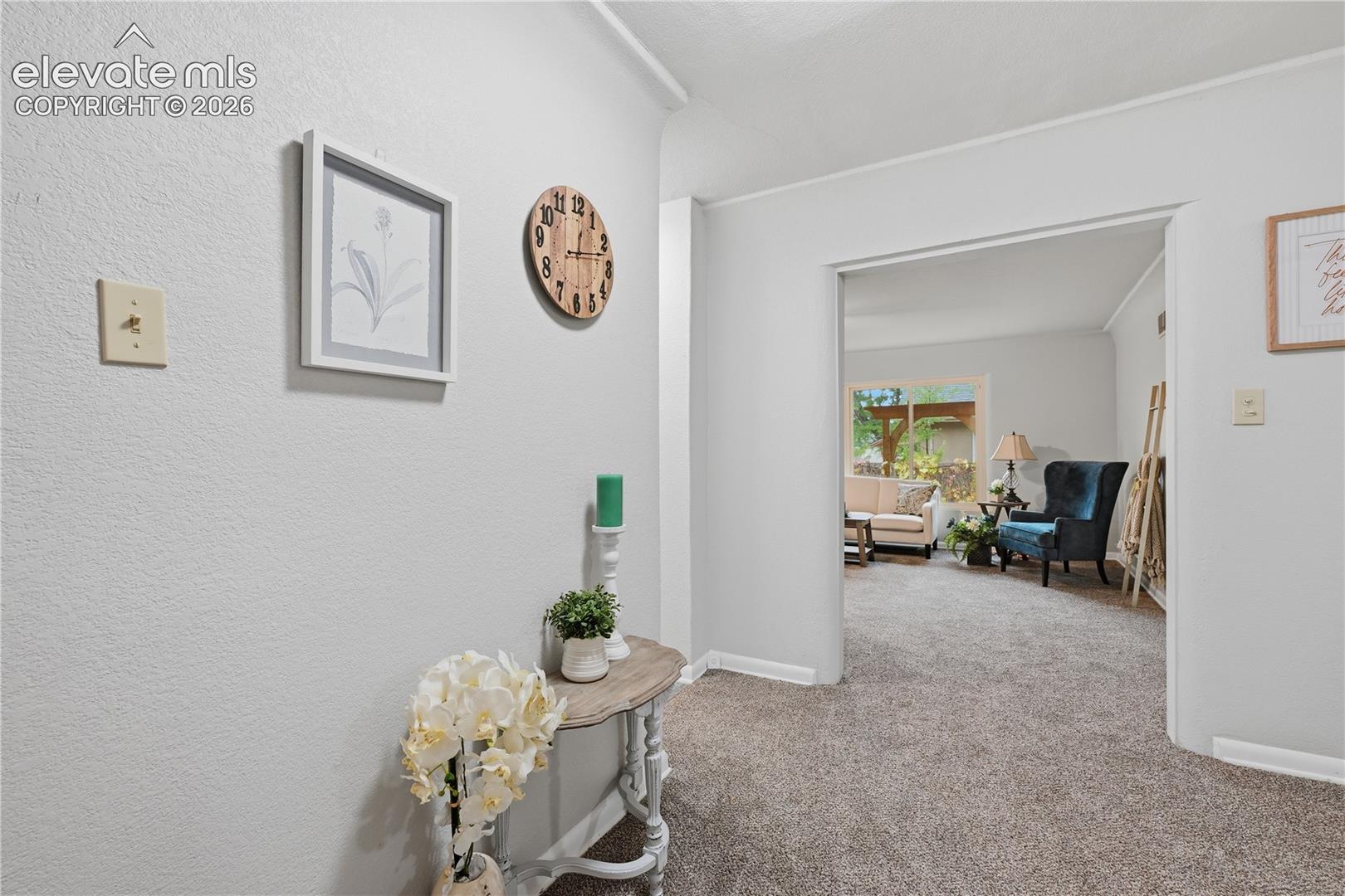 Just inside the front door looking into the large living room. 