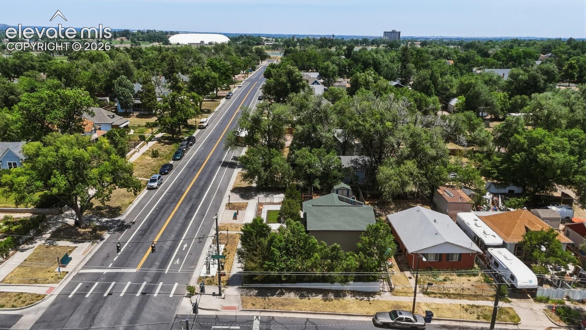 Aerial view of home and neighborhood.