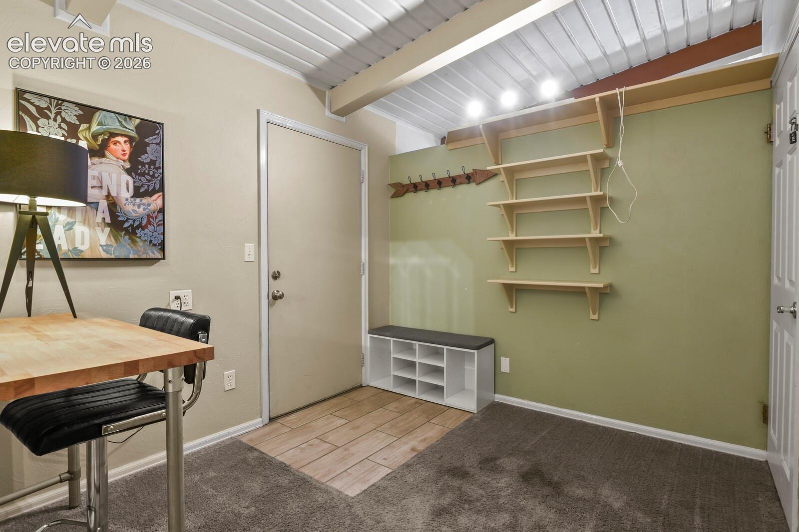 Small office area off the entrance to the garage.