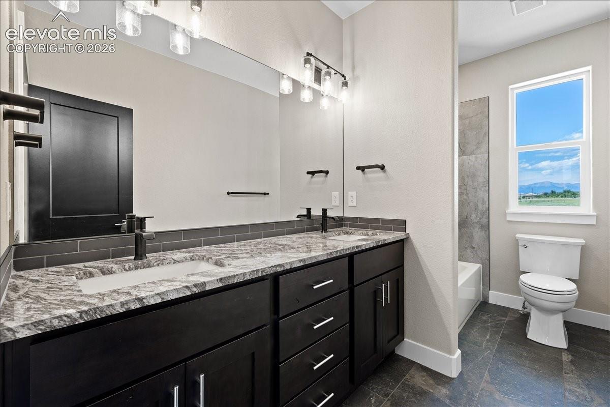 This is the same floor plan, built by the same builder, in the same neighborhood. Finishes will vary based on buyer's custom selections.