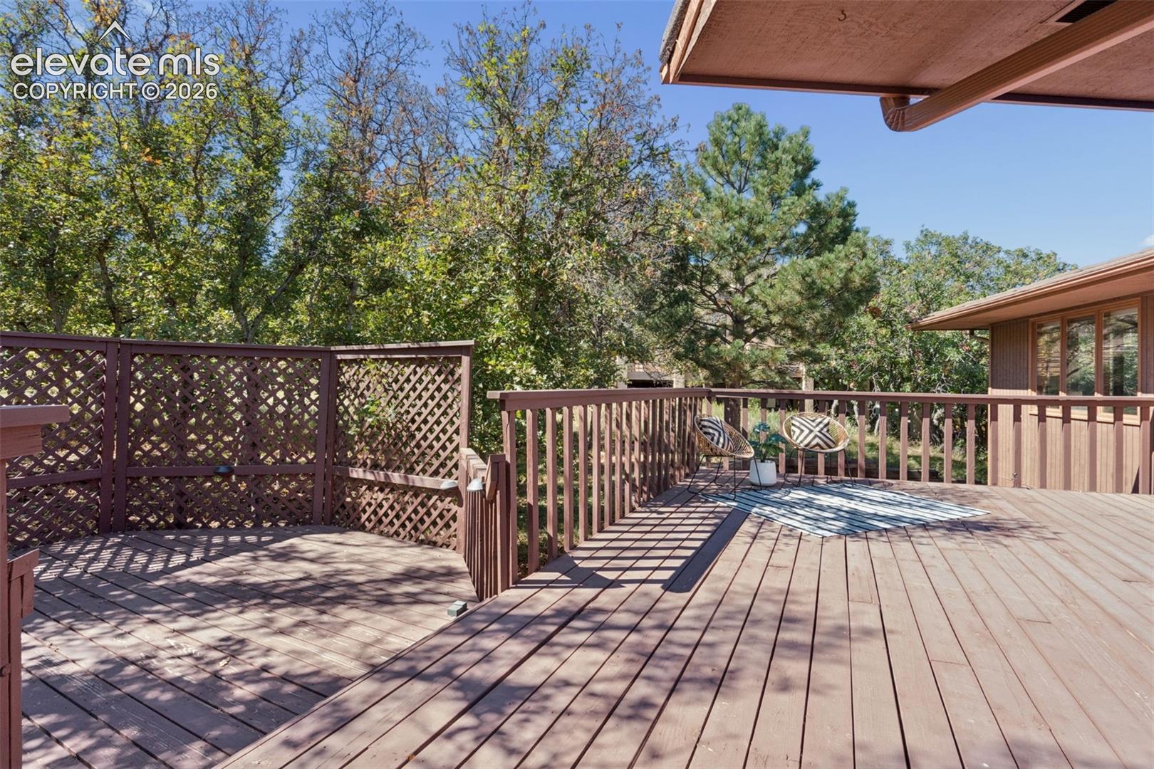 Expansive wood deck with a full railing system