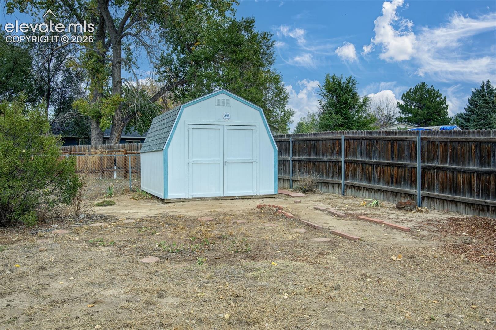 Storage Shed with New Roof 
