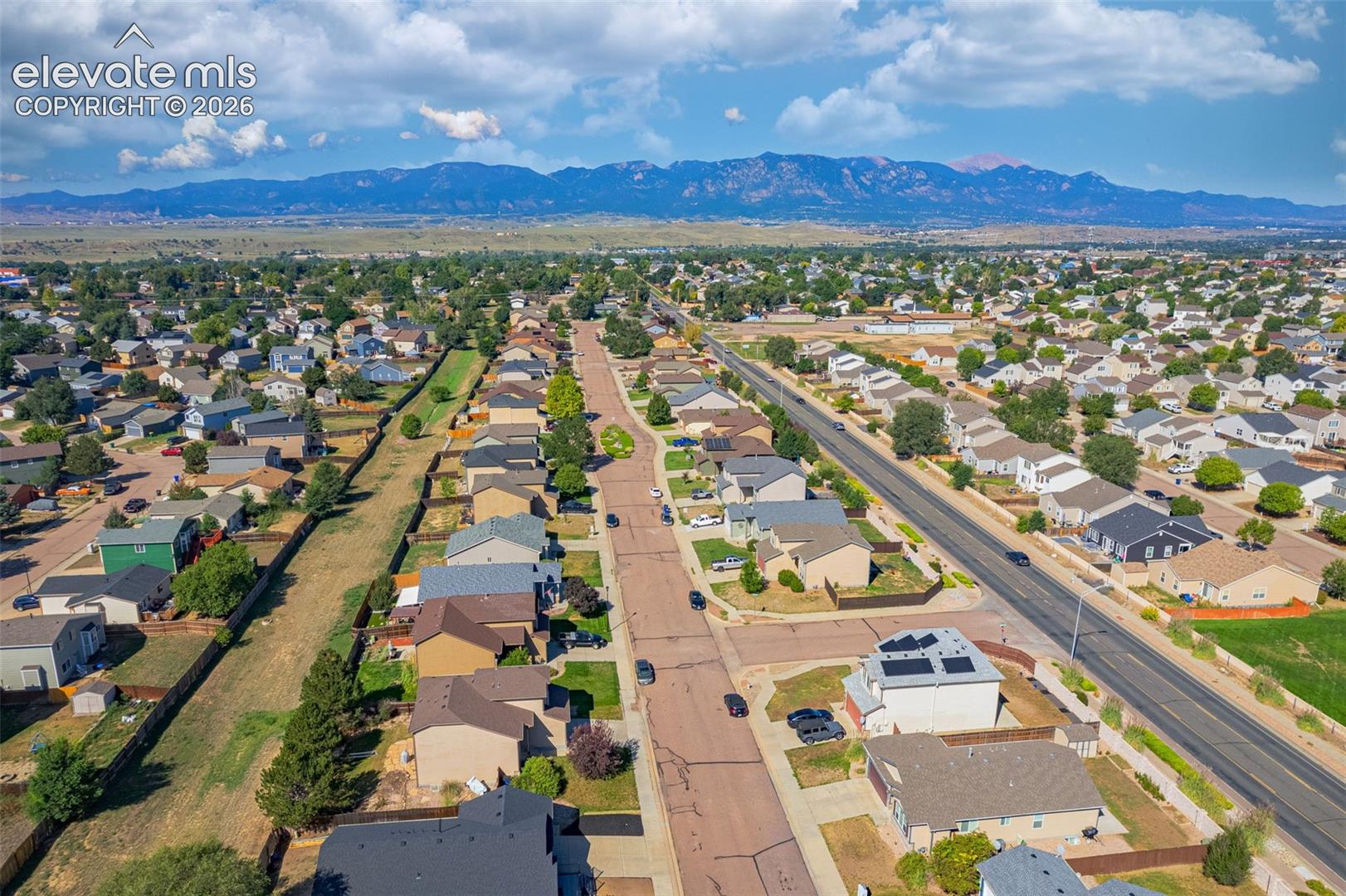 Expansive residential area with a mountain backdrop
