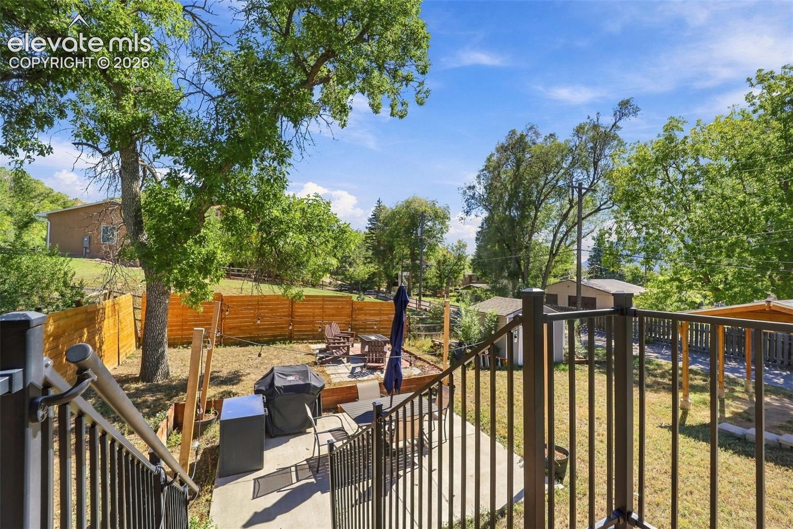 Stairs from second bedroom to back yard
