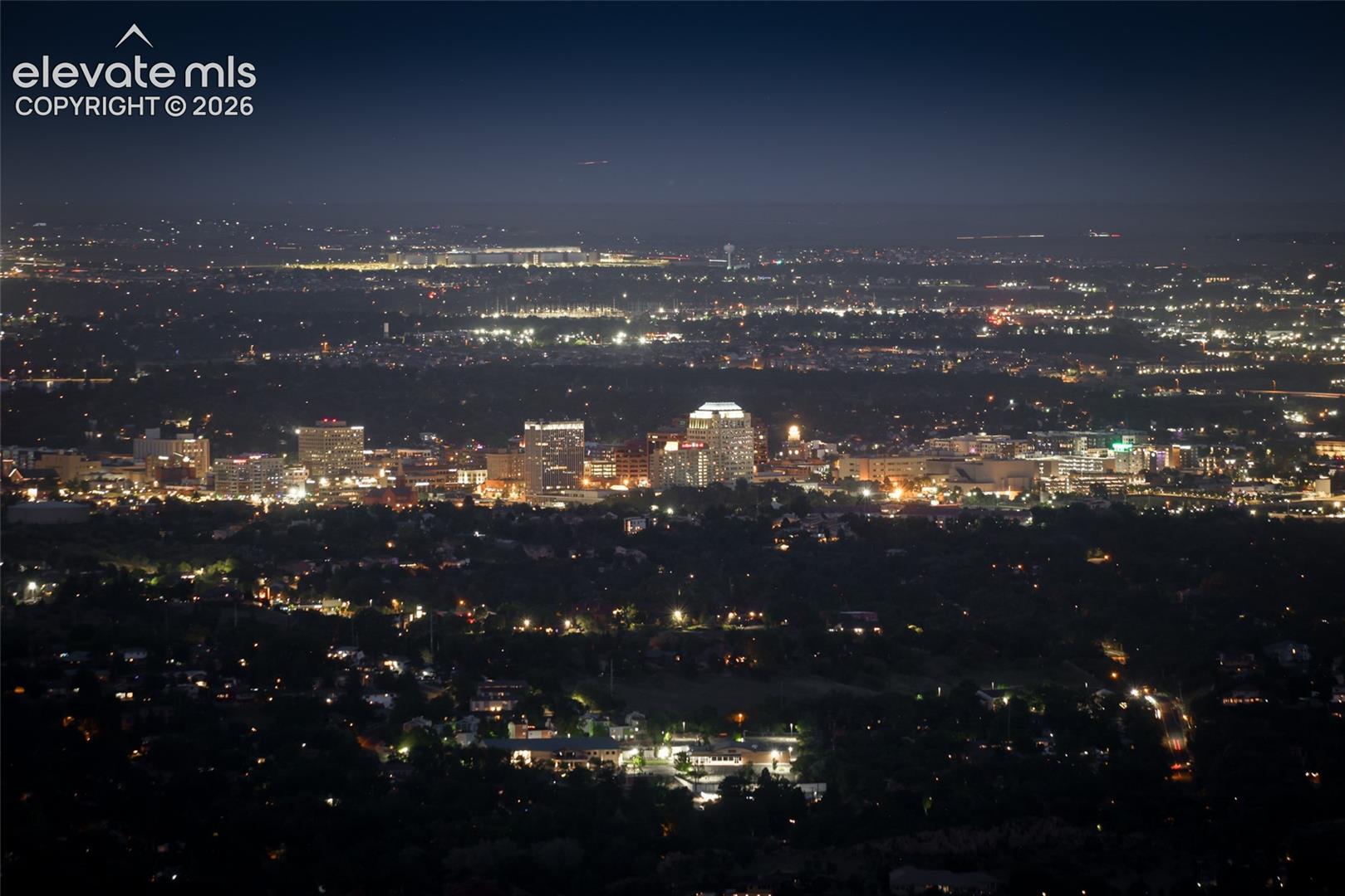Sparkling lights of Colorado Springs to the east
