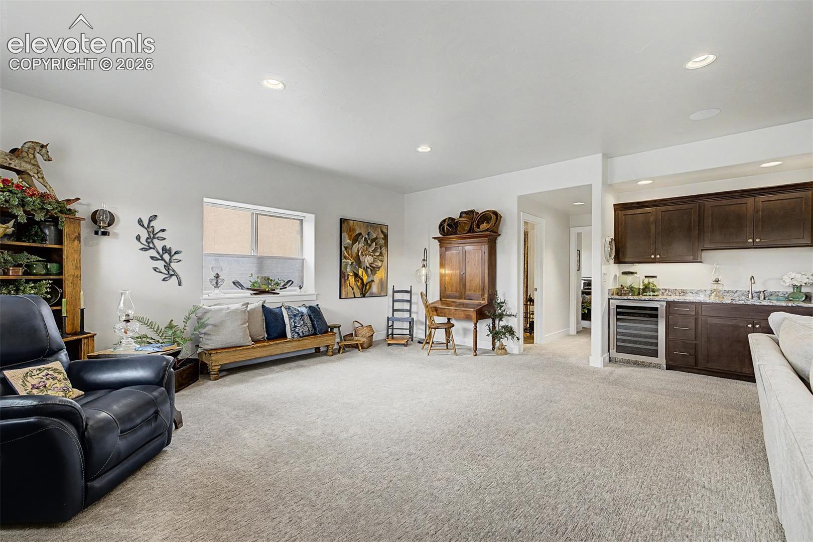Lots of extra space for a gaming table, billiards table, sitting area, or even an office!