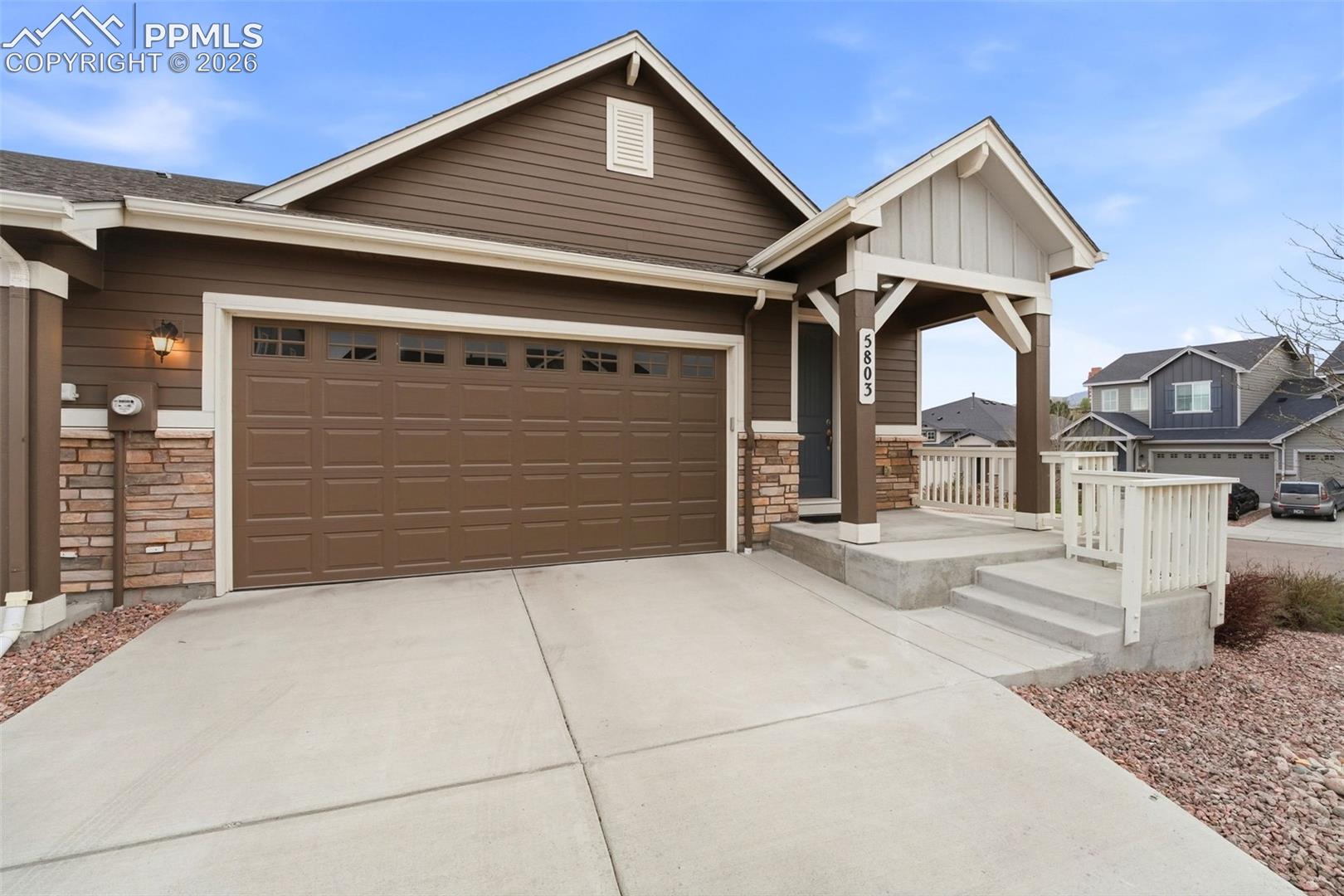 Welcome to this stylish Rockrimmon ranch on Colorado Springs’ coveted West Side | Main-level primary suite plus a fully finished lower level. Sited backing a large open green with direct neighborhood trail access for hiking, walking, or biking, the home offers bright, open living with 9-ft ceilings and durable laminate plank flooring on the main level.The island kitchen features espresso-stained cabinets, granite counters, subway-tile backsplash, pendant & LED lighting, pantry, and stainless appliances including a gas range and French-door refrigerator. The oversized island opens to the dining area and deck — grill from your deck while enjoying sweeping Pikes Peak views.Main level: two bedrooms, first being the primary suite with a tiled shower, dual sinks, and generous walk-in closet, plus a second bedroom served by a separate full guest bath. Main-level laundry and thoughtful finishes complete the ranch plan.Finished basement: large open living area, an additional bedroom (three total), abundant storage, and flexible space ideal for a theater area, home gym, playroom or easily convert part of this space into a fourth bedroom and still have ample room.Additional highlights: oversized two-car garage, included washer/dryer, window coverings throughout, move-in ready modern finishes, and exceptionally convenient location with easy access to I-25 and nearby University Village shopping (Costco, Lowe’s, Trader Joe’s and numerous dining options). Perfect blend of single-level living, finished lower level flexibility, outdoor access and mountain views.