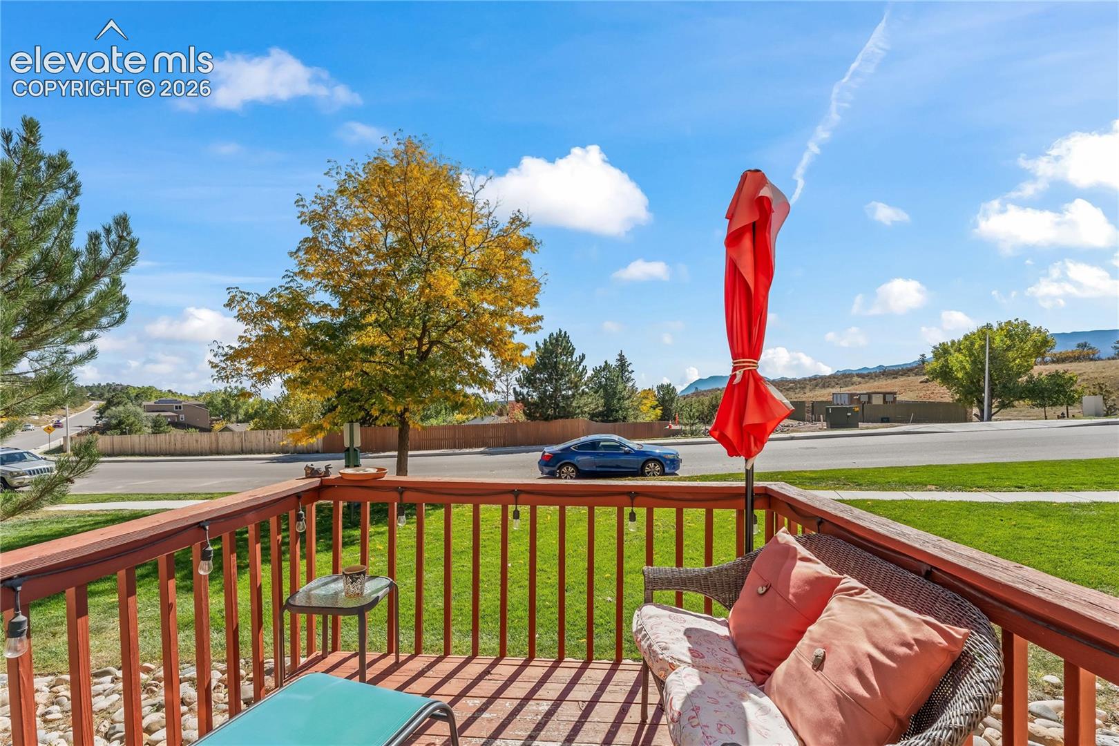 Wood-tone deck with wood railing
