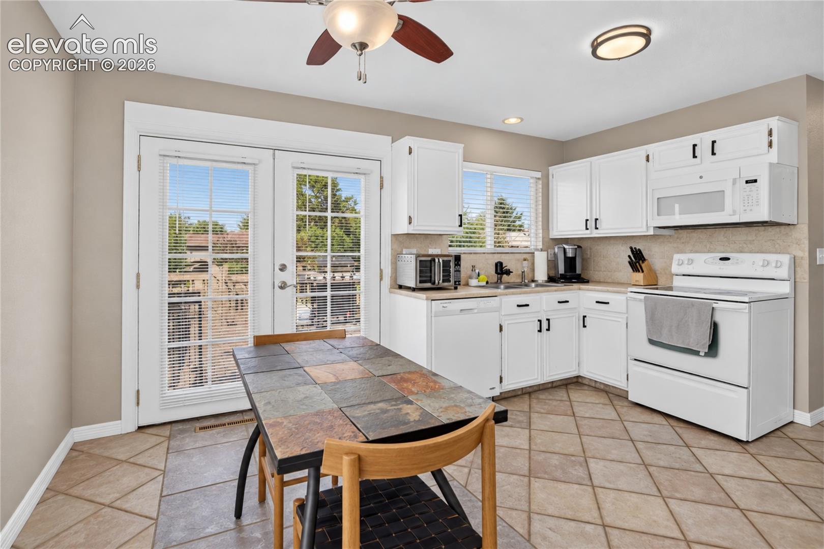  - dining area w/ walk-out to deck