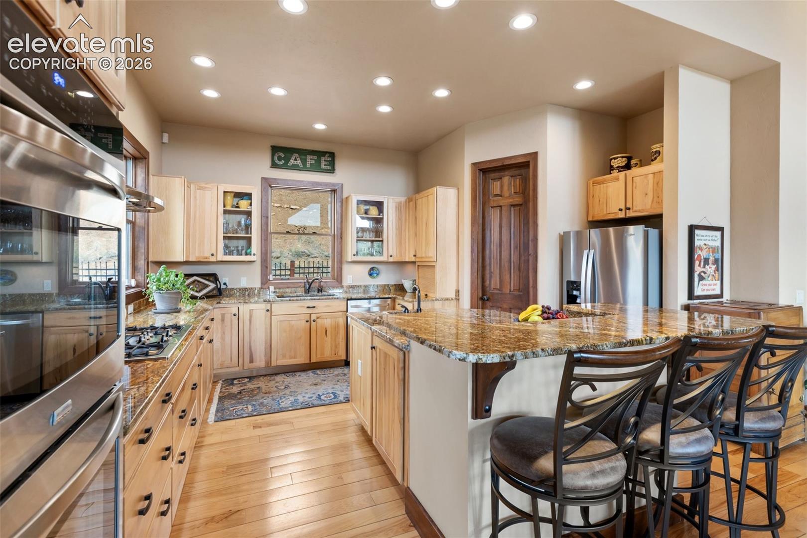 Kitchen with breakfast bar/island