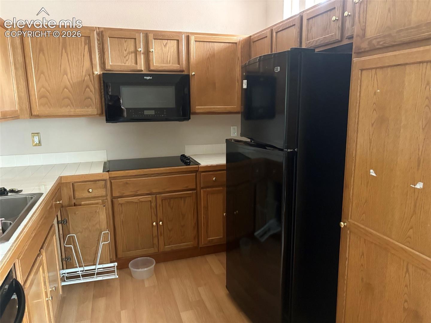 Kitchen with convection/microwave and cooktop