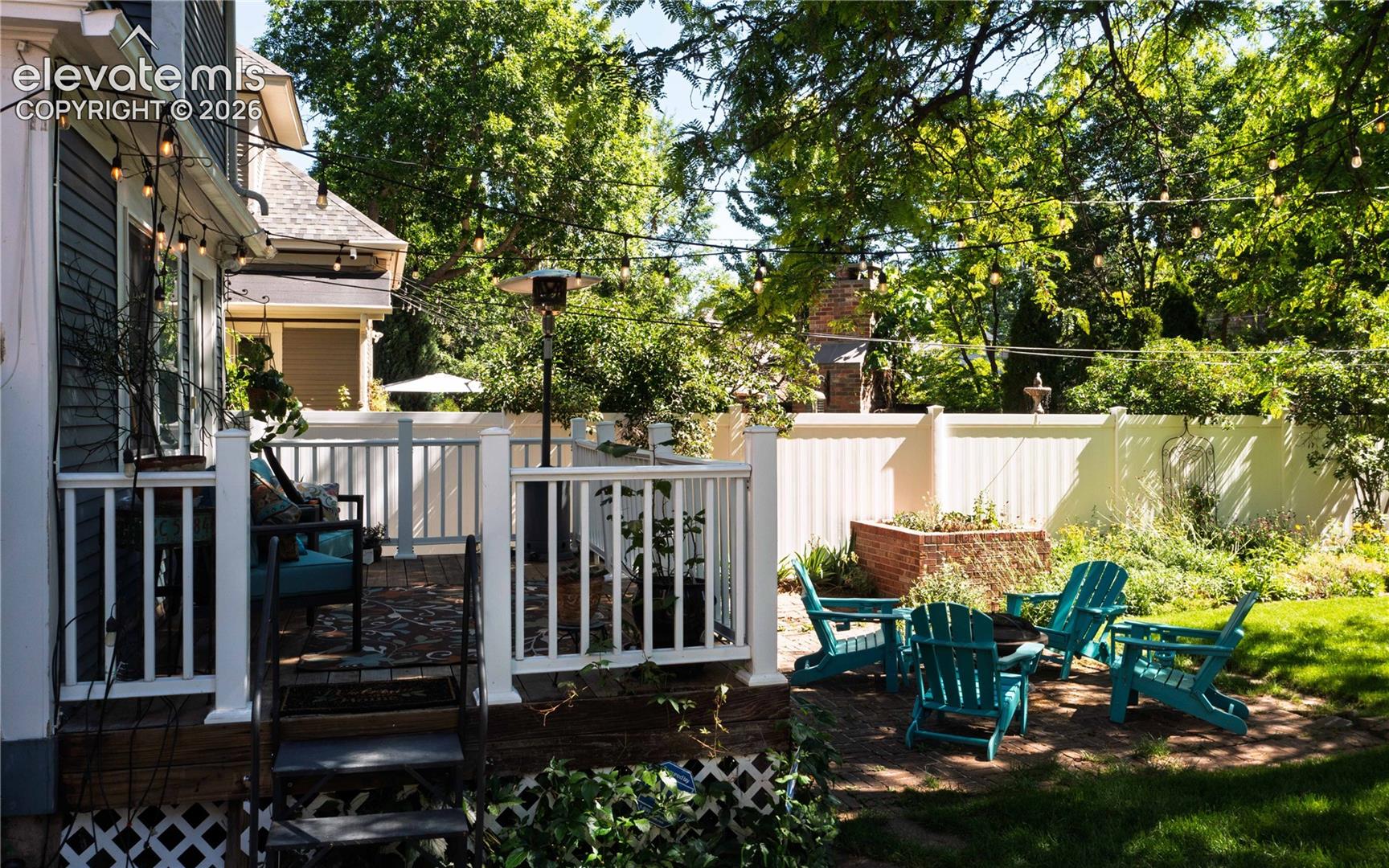 A deck plus a lower brick patio for endless summer entertaining