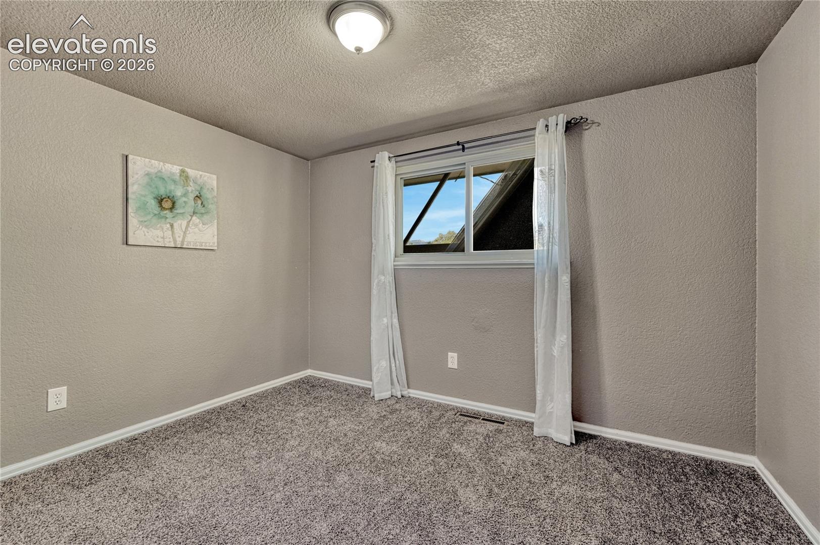 3rd Main Level Bedroom with Pikes Peak View!