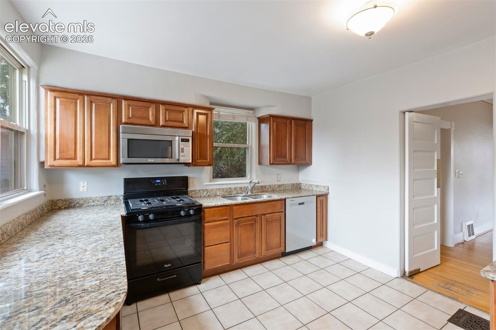Update kitchen, walk out access, granite counters
