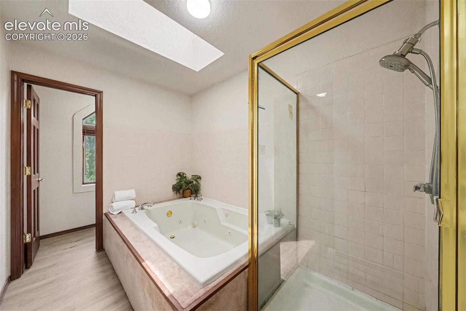 The bright, inviting space offers comfort and a relaxing retreat.