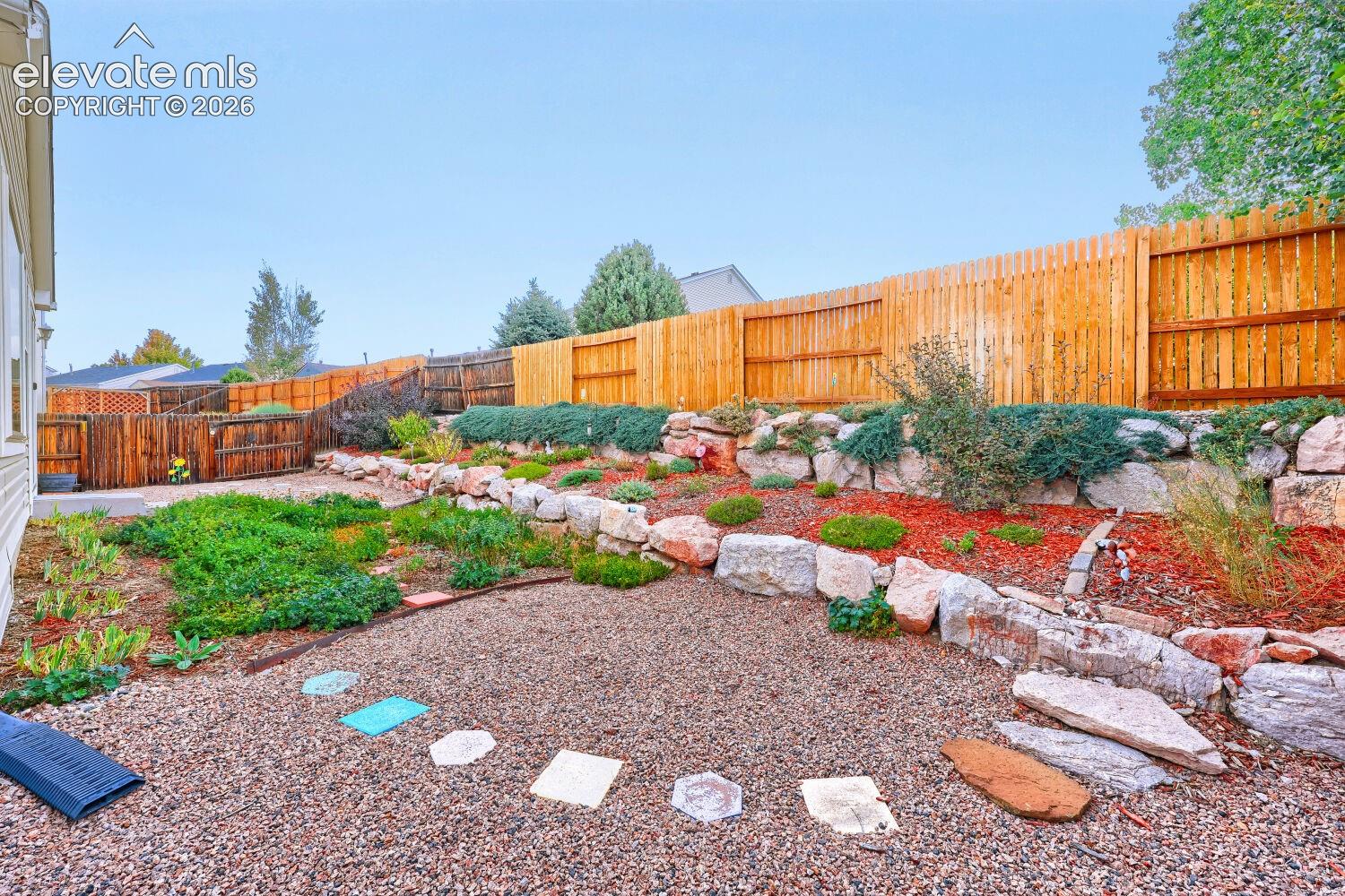 Beautifully maintained yard with sprinkler system