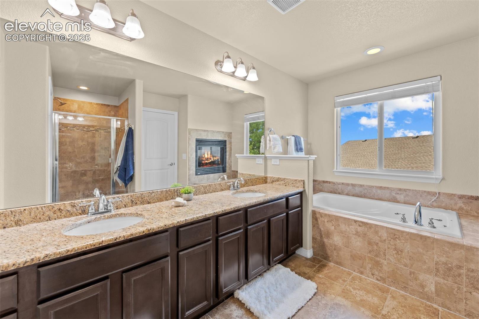 primary tub and dual vanity
