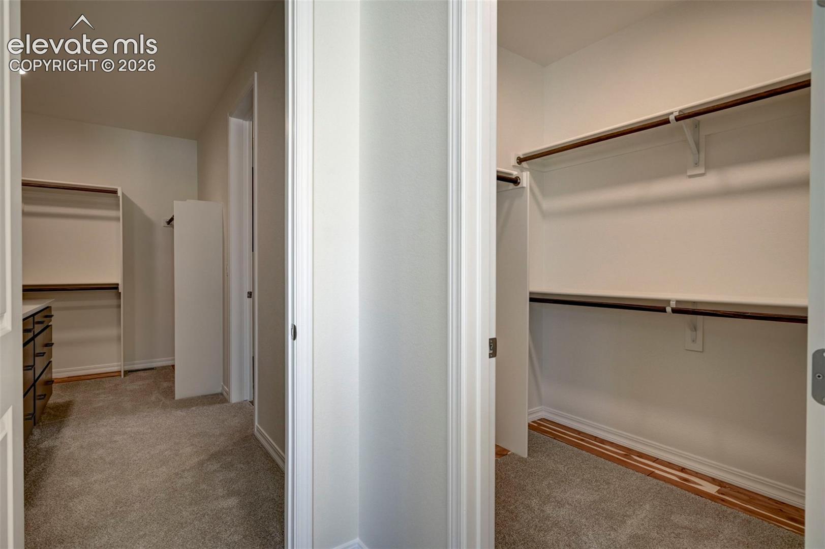 showing closet 1 and 2 in primary (walk-in and wardrobe)