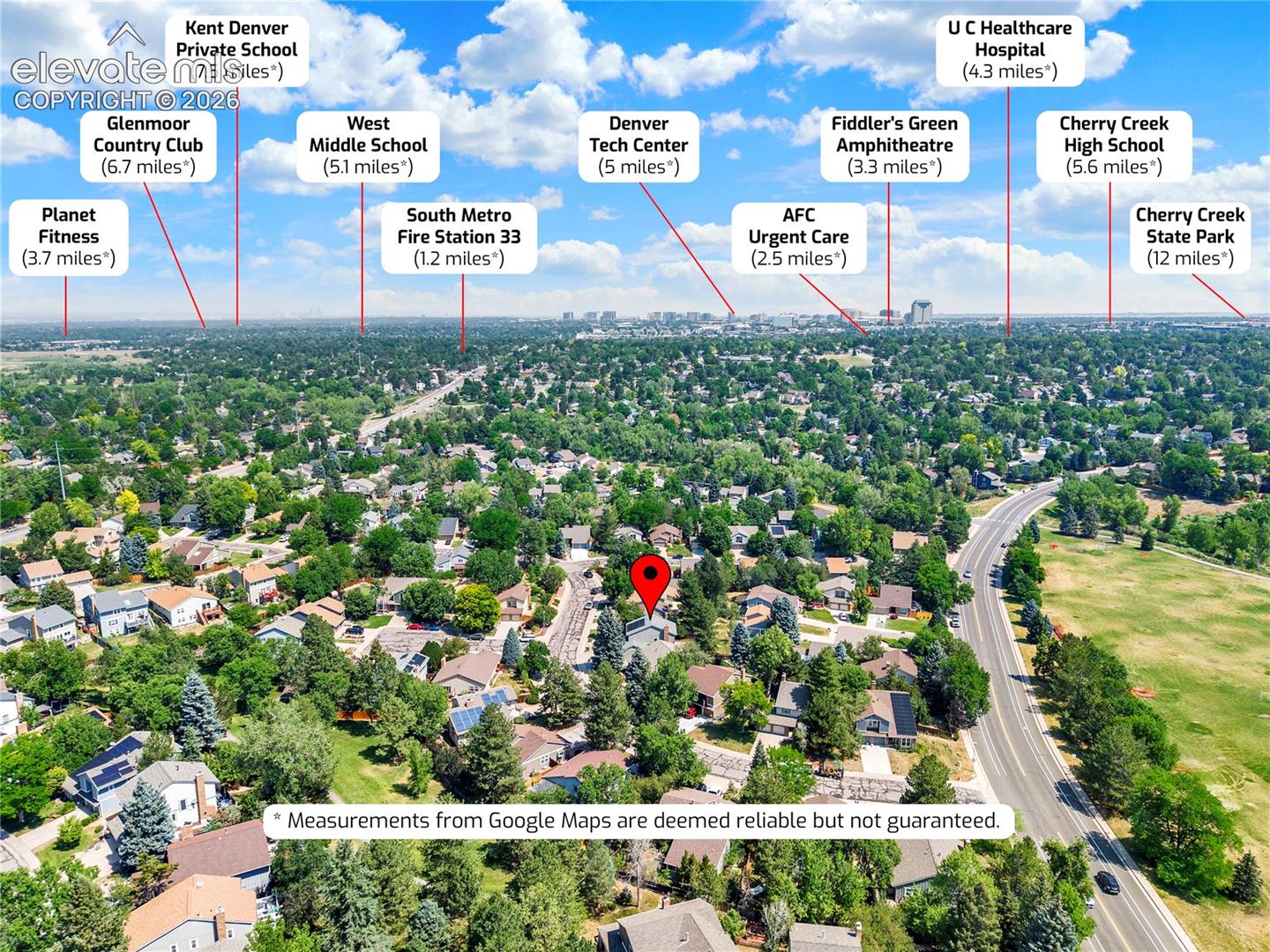 Aerial perspective of a suburban neighborhood featuring mature trees, interspersed residential dwellings, and proximity to major roadways