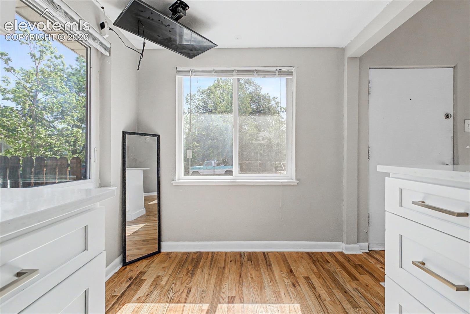 Hardwood flooring throughout main level with walk-in closet
