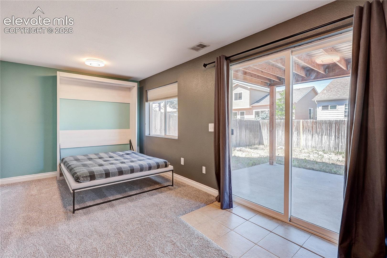 Lower level walkout with murphy bed, perfect for guests.
