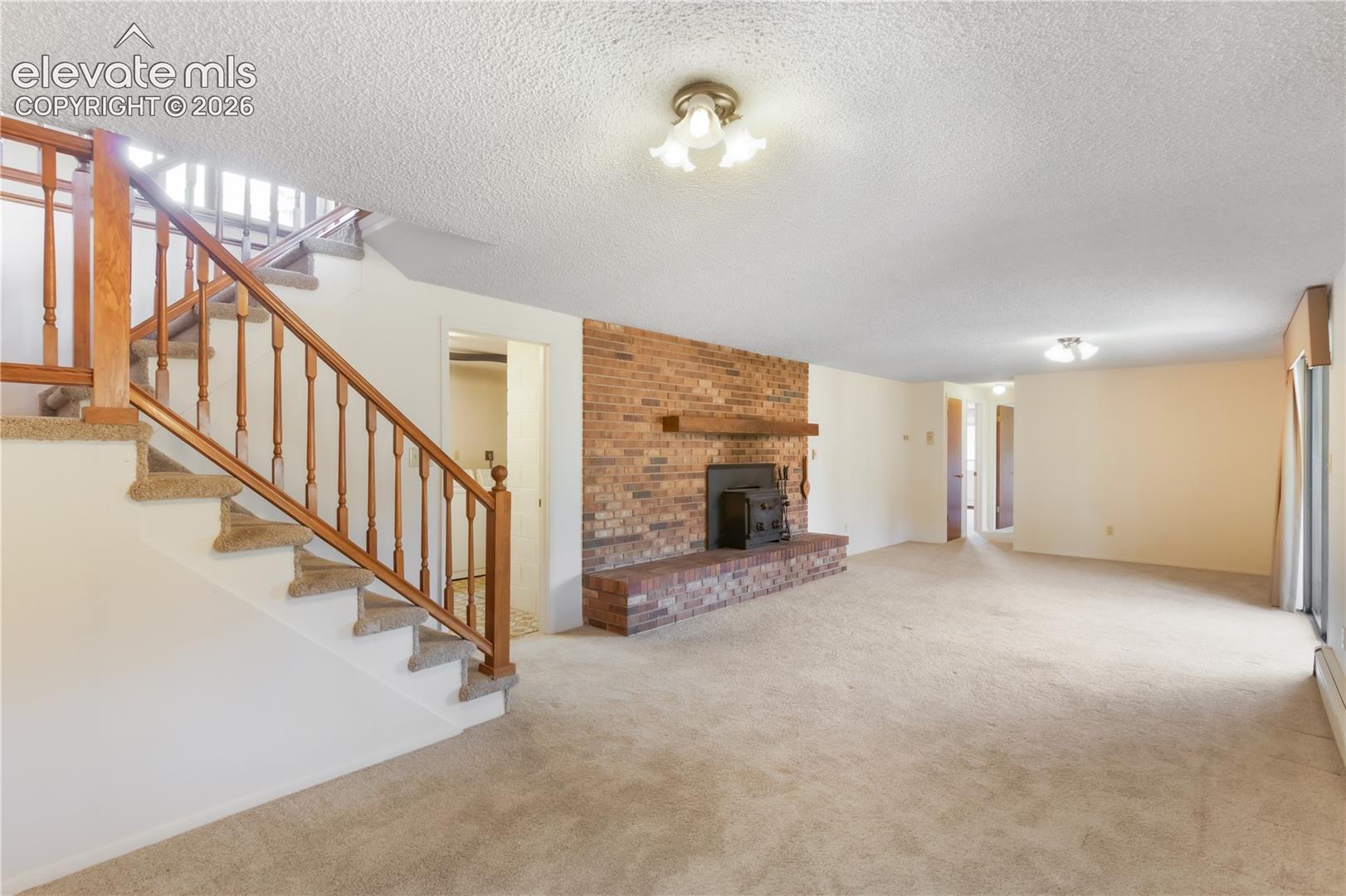 Basement family room with wood burning stove