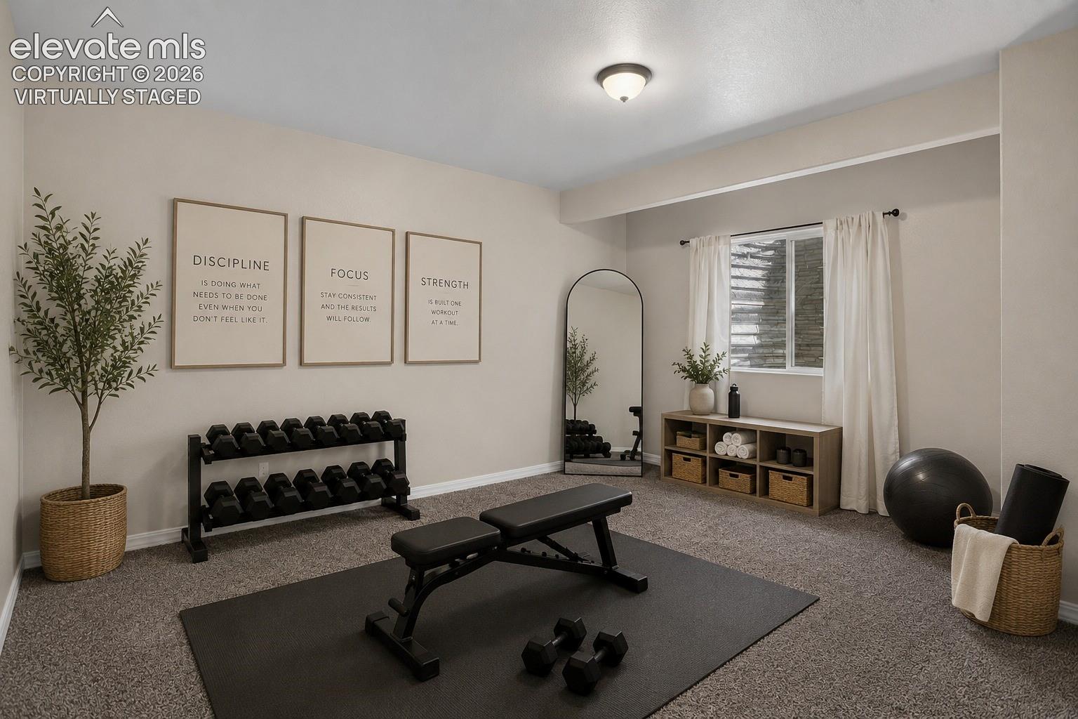 Virtually Staged - Carpeted room with a ceiling-mounted light fixture, window with blinds, and built-in shelving