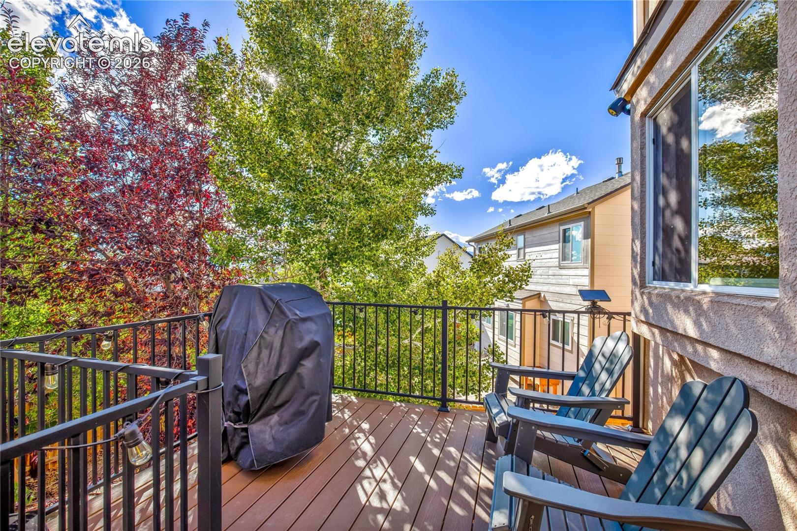 Updated in 2021, the spacious composite deck provides a welcoming setting for morning coffee, outdoor dining + relaxing among mature trees.