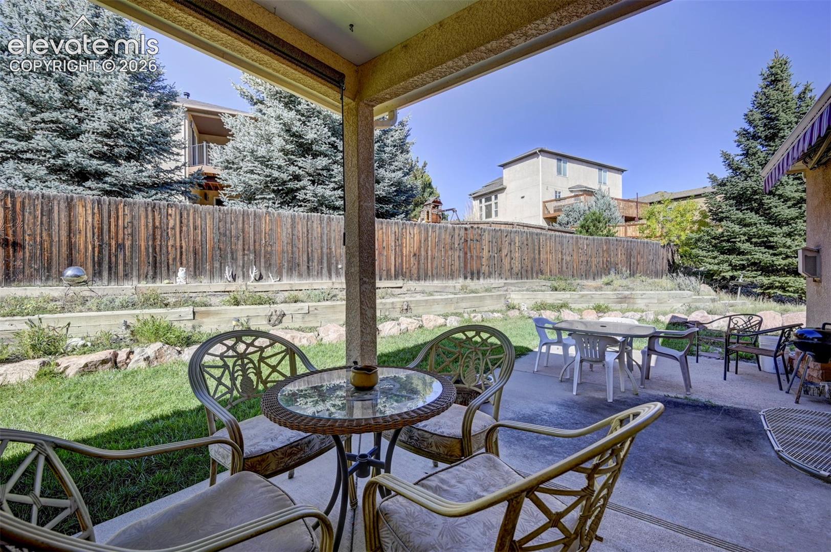 Covered Patio overlooking the backyard.