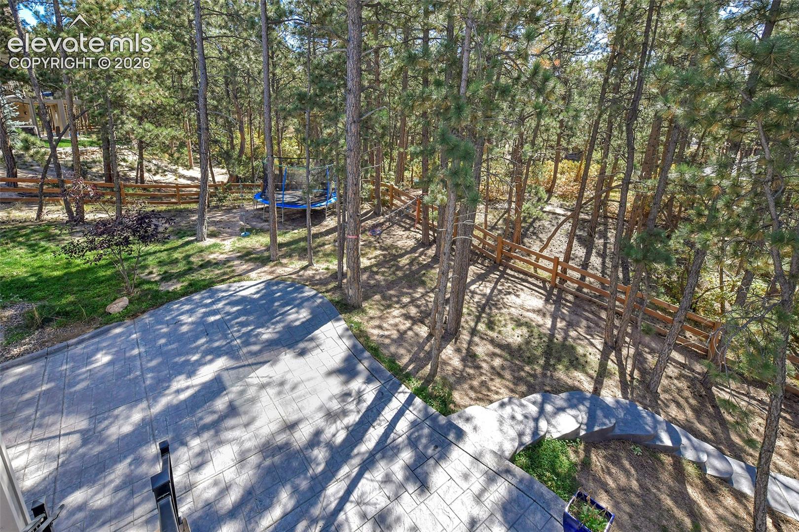 Fenced backyard with walking/biking trails just on the other side!