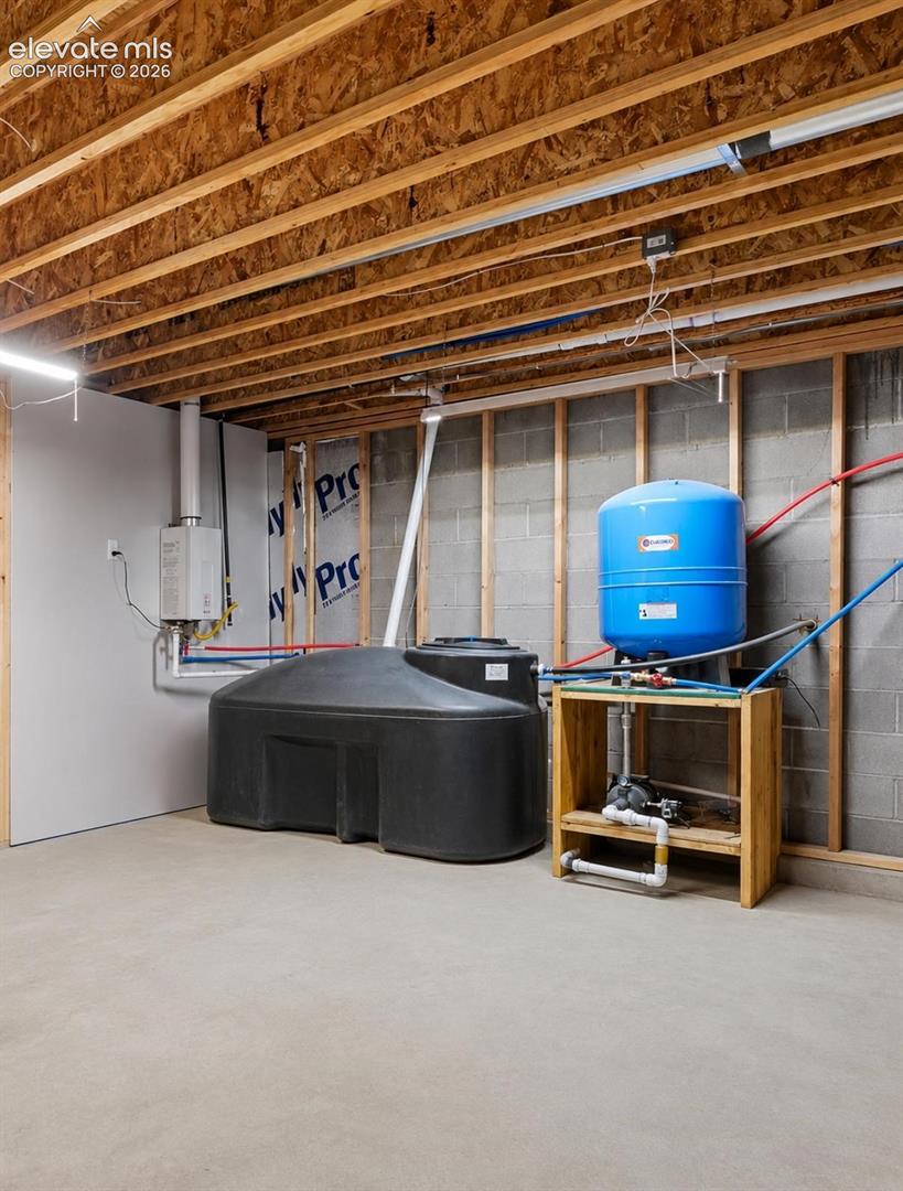 Storage Room with instant hot water heater and cistern