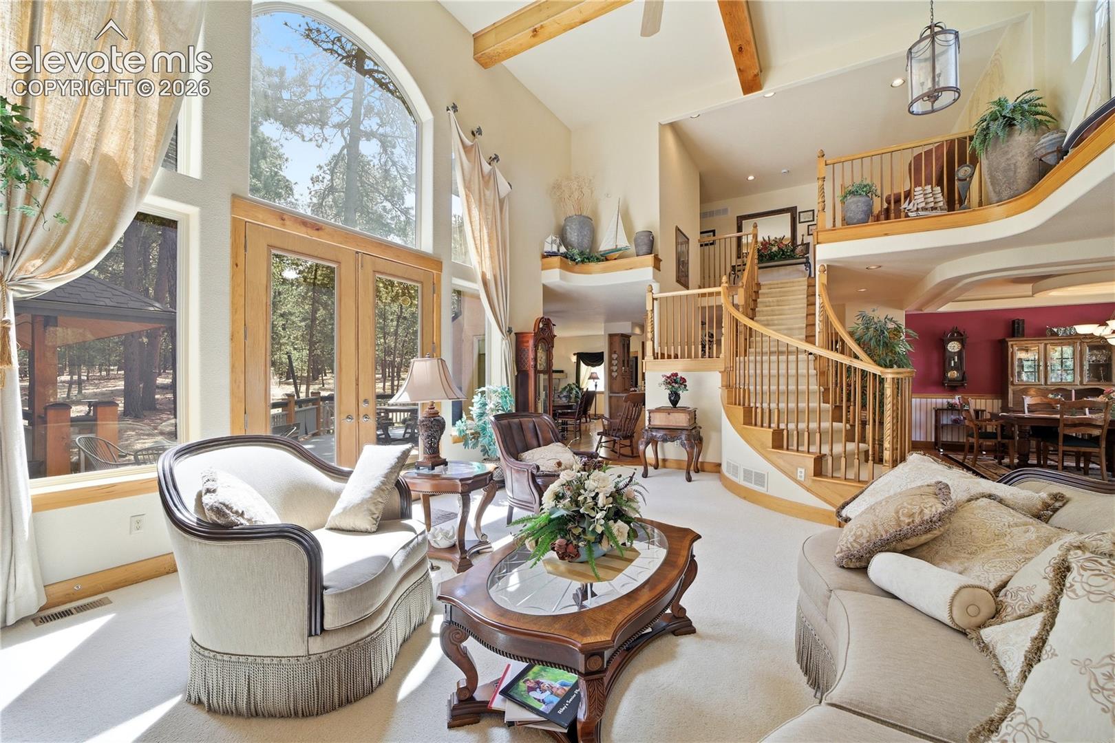 2 Story high ceiling, wood beams, butternut woodwork.