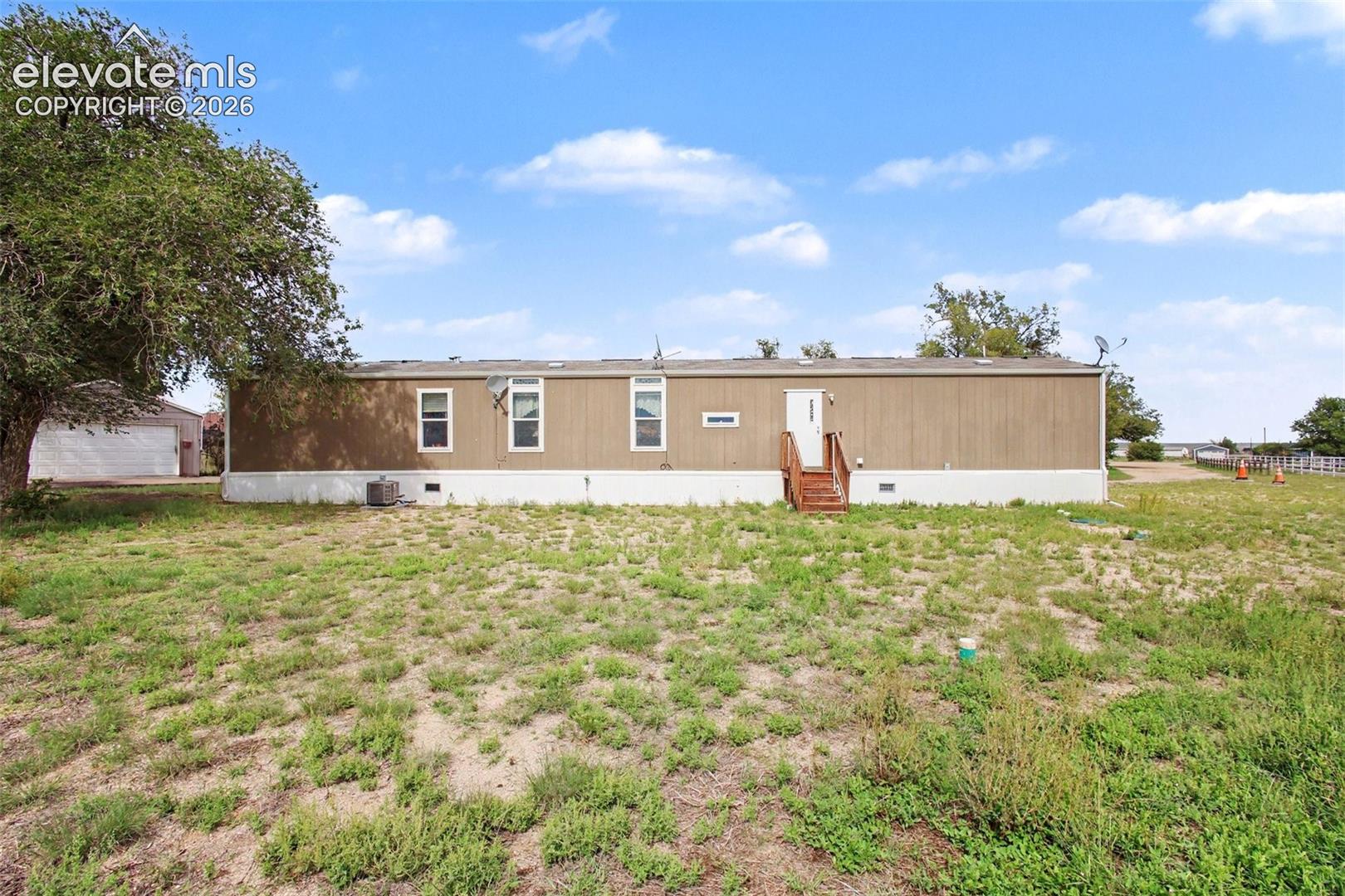 2nd Home: Enjoy open space, peaceful surroundings, and beautiful views from the back of the home—an ideal setting for relaxing and taking in the scenery.
