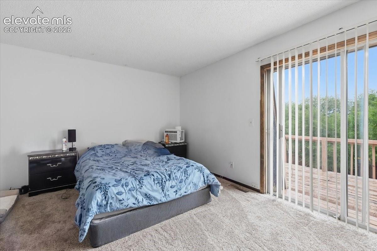 Unit 726 - Primary Bedroom with Deck Access