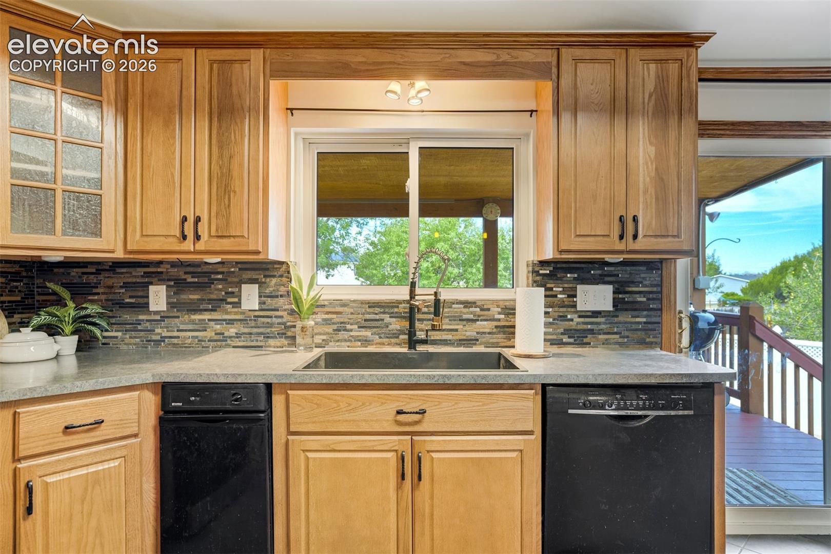 Trash compactor and custom cabinetry. 