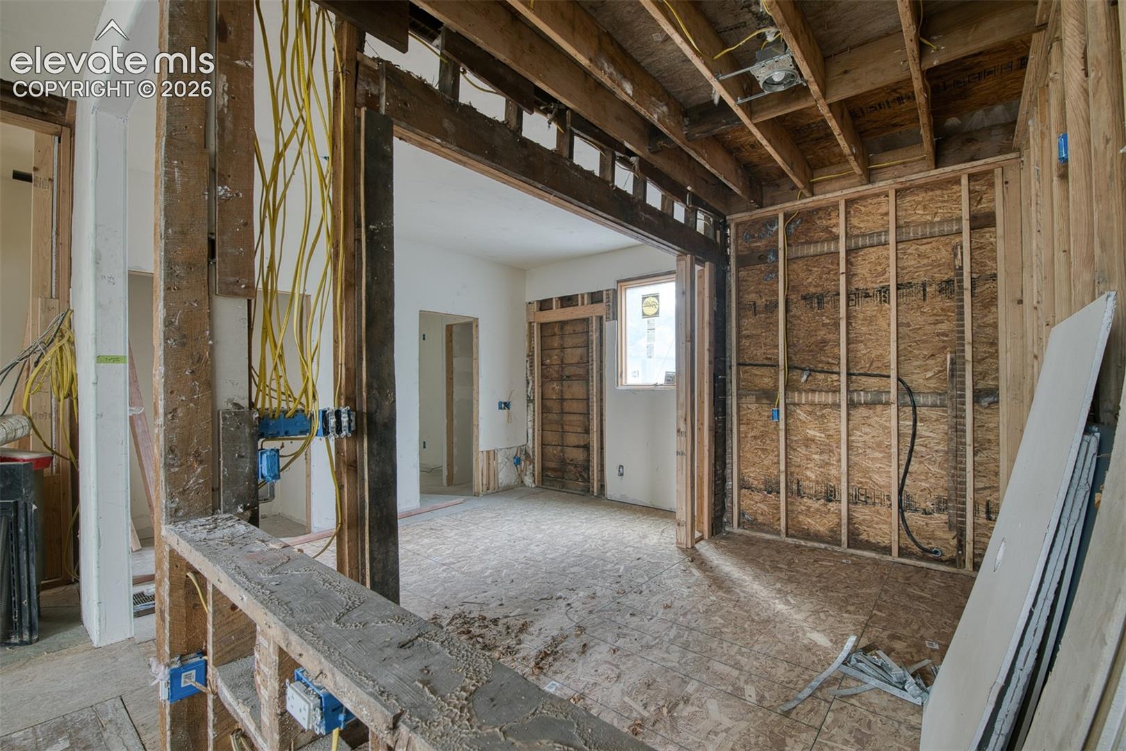 Kitchen area with pass through or breakfast bar area. 