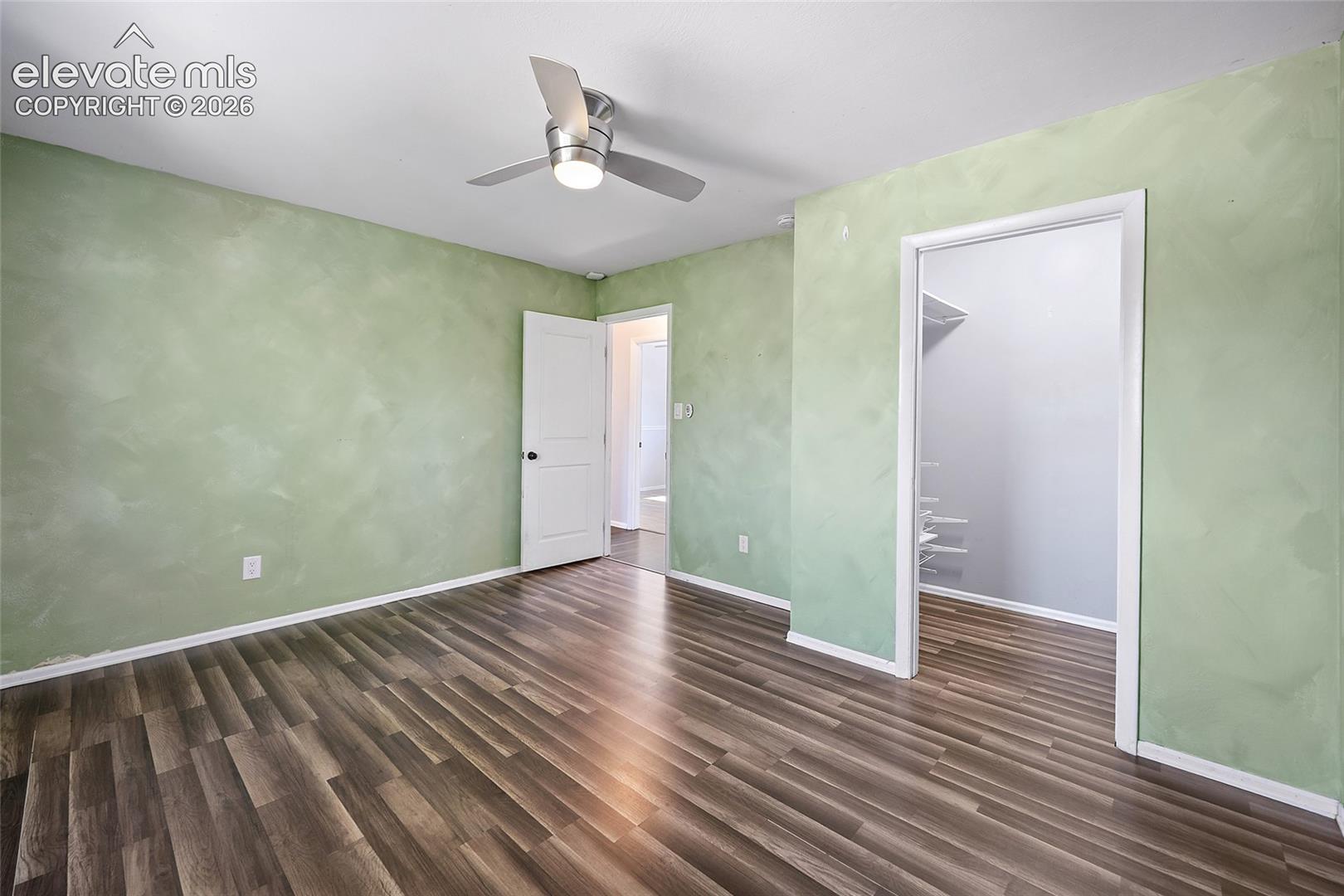 Bedroom with view of closet