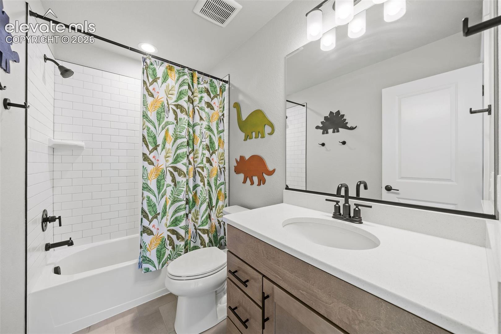 This is the first of two private bathrooms on the upper level.