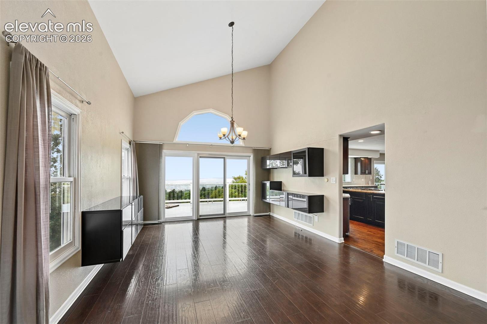 Unstaged Dining room with walkout to large upper deck