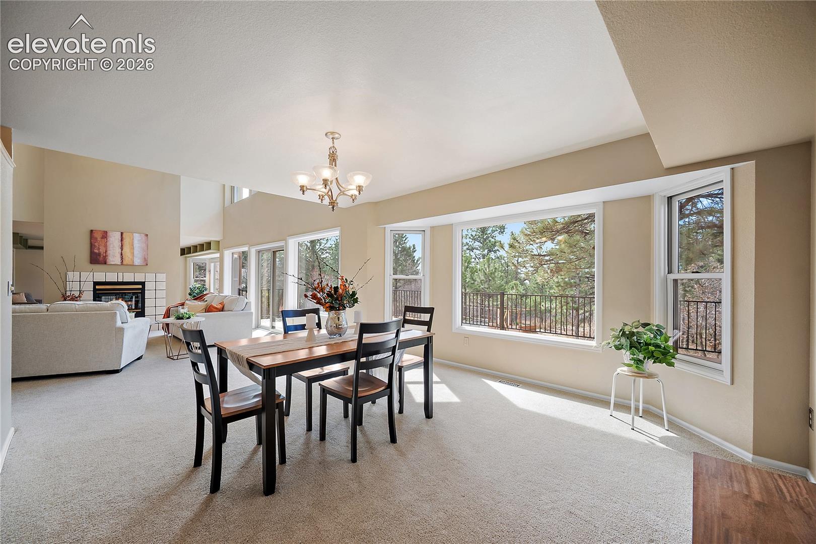 Formal dining room, stunning views and bay window. 
