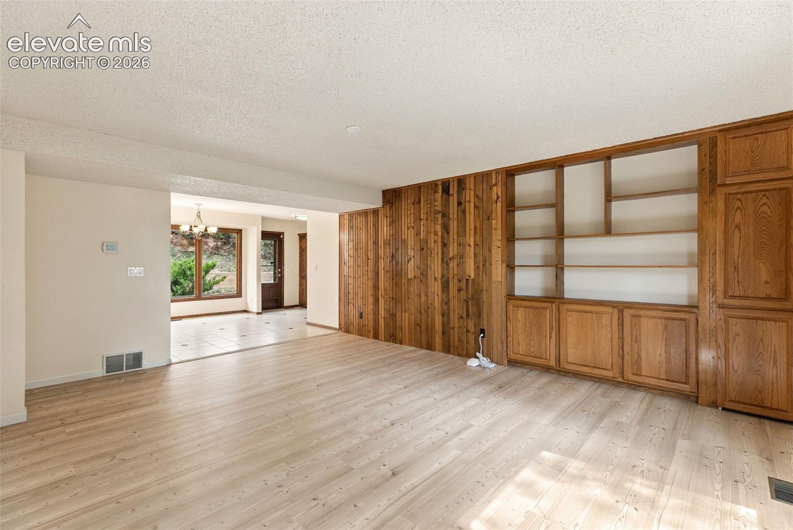 Main level family room with built-ins.
