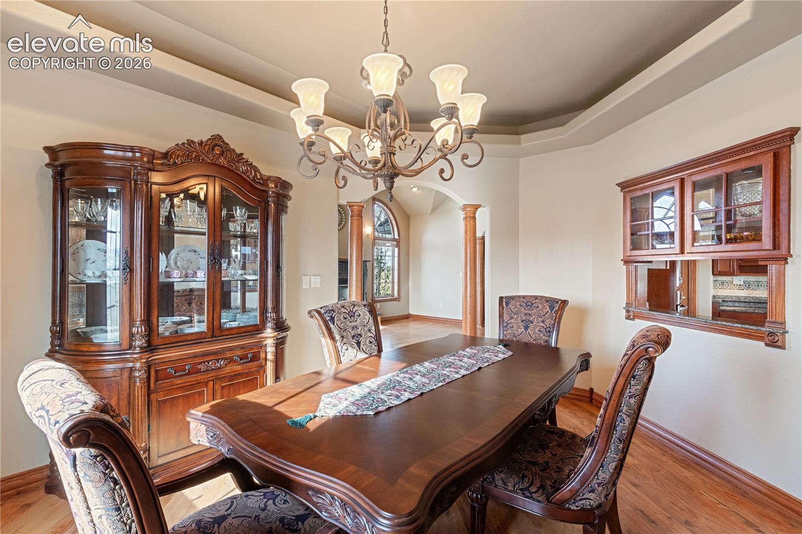 Dining room, looking into living room. Window to kitchen.