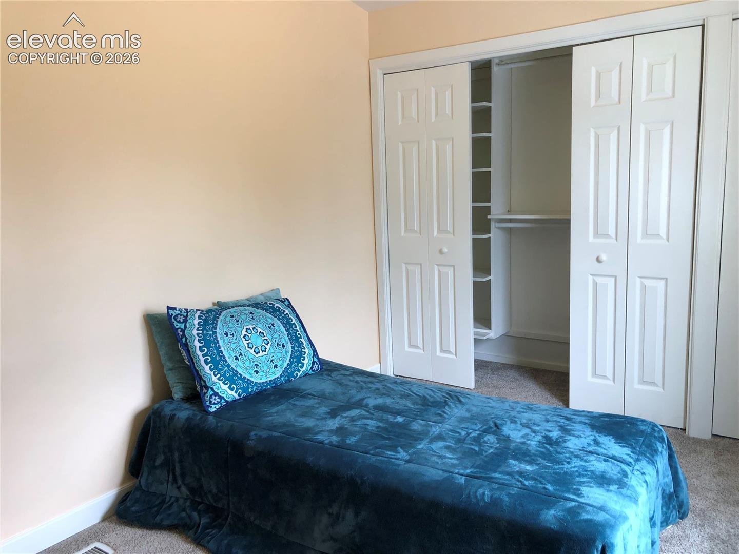 Second Bedroom, Closet space with built in shelving