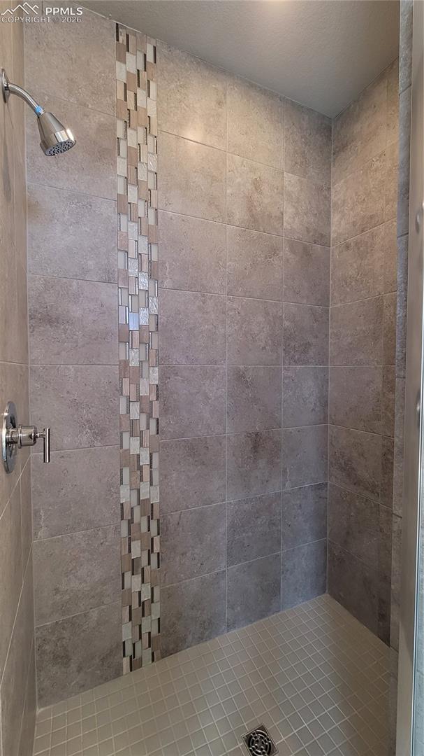 Primary Shower with Tile Surround! 
