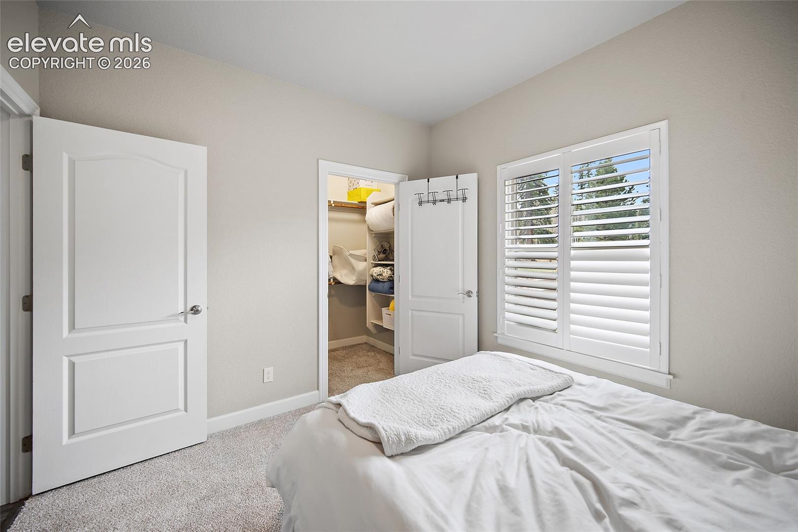 Bedroom with large windows