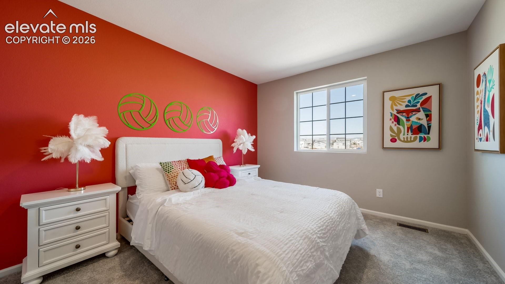 Recessed lighting, window with grid panes, textured carpet flooring, and two-tone wall finishes
*photos of a model home*
