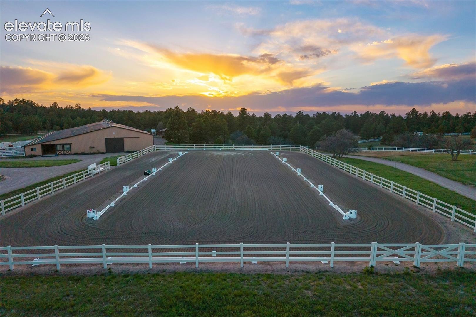 Outdoor arena measuring 210 ft x 120 ft. 