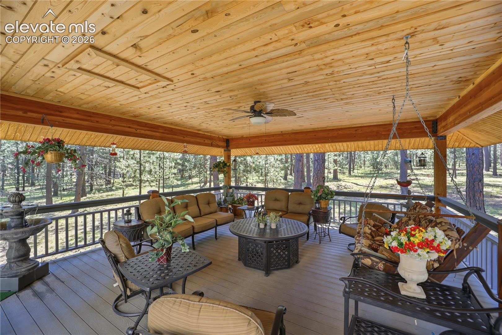 Year round outdoor living space in this covered deck