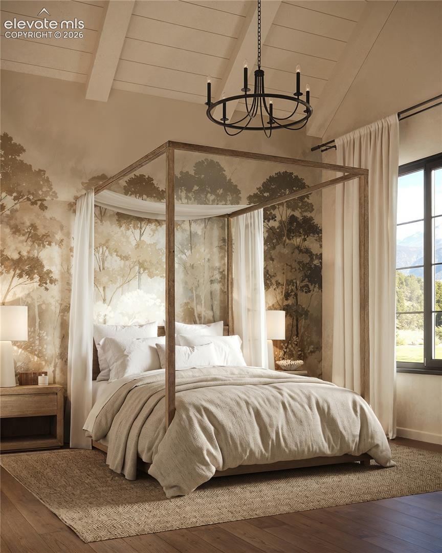 Vaulted ceiling with exposed beams, wood-finish flooring, accent wall with sylvan mural, large window with dark trim, and a black chandelier