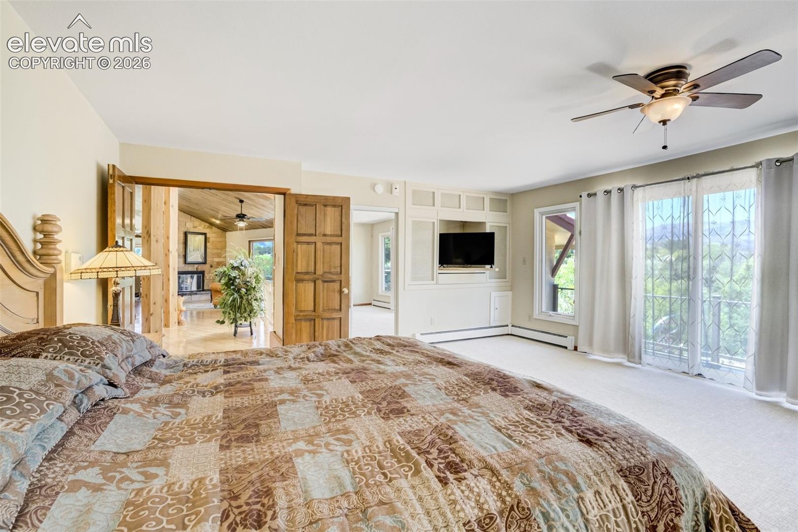 Primary bedroom has French Doors off the entry foyer.